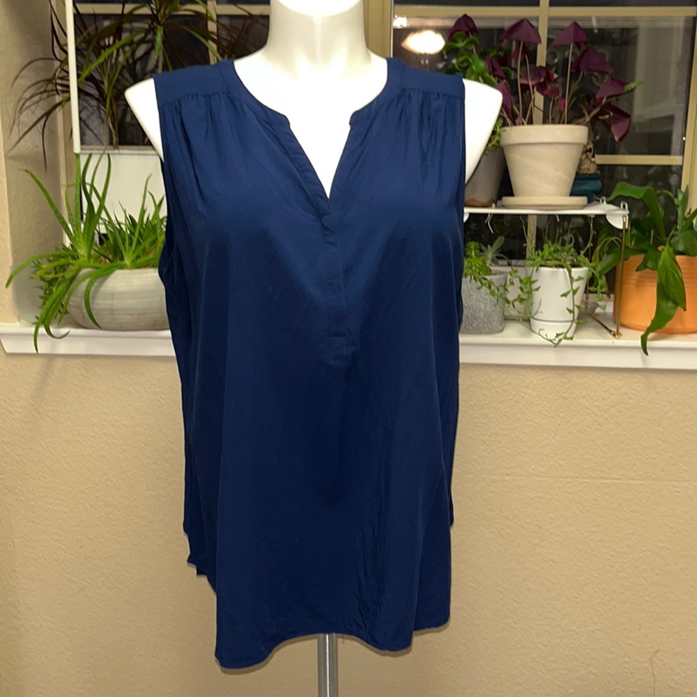 Navy sleeveless tunic.